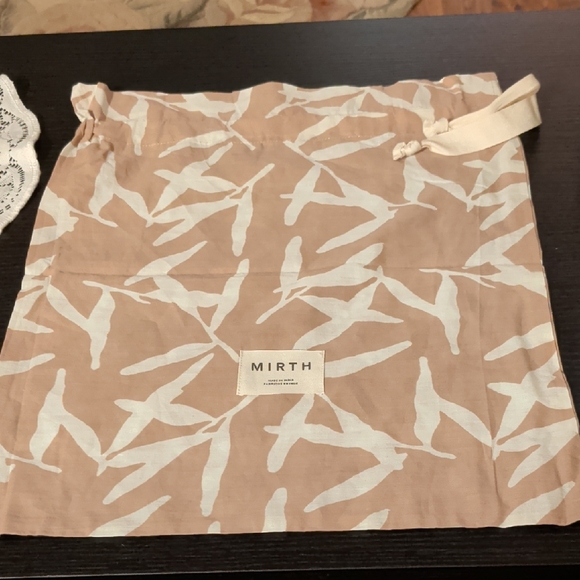 MIRTH Dresses & Skirts - MIRTH Tan and White Dust Bag